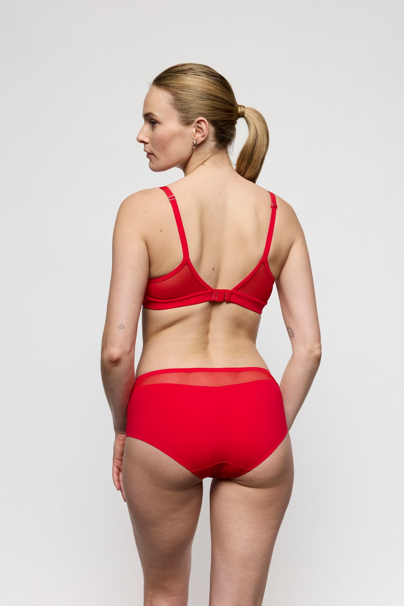 Marie Jo Louie Padded Balcony Bra styled on model in True Red