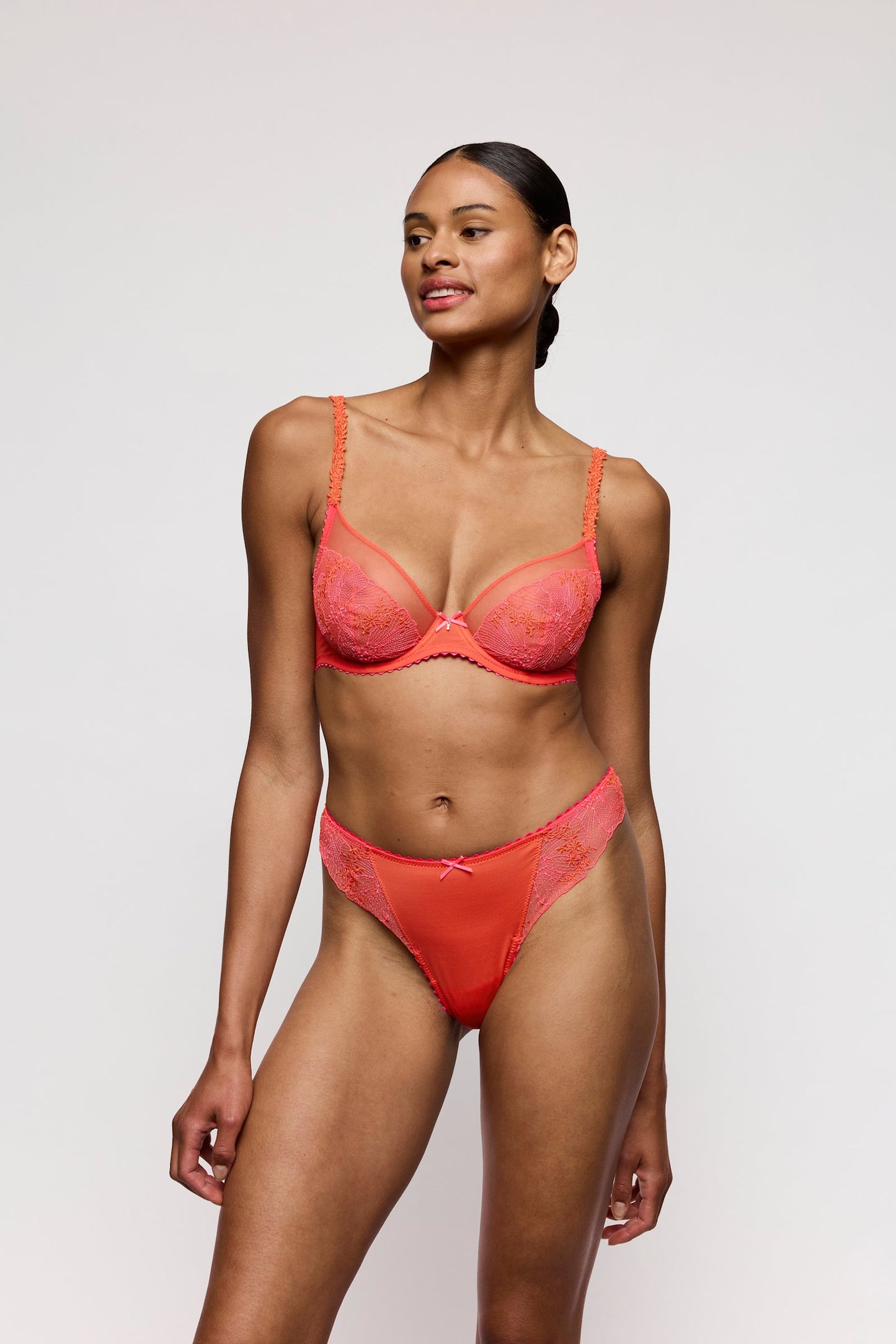 Marie Jo Solene Plunge Bra styled on model in Pamplemousse