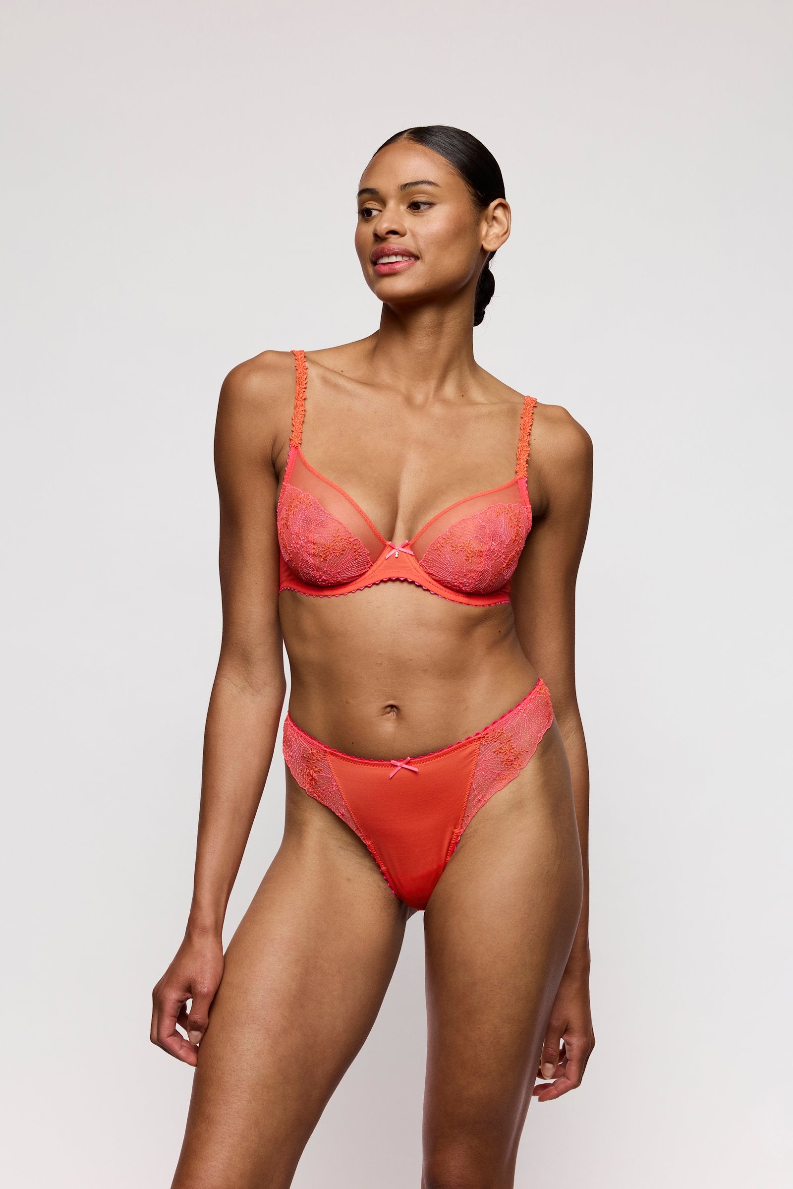 Marie Jo Solene Plunge Bra styled on model in Pamplemousse