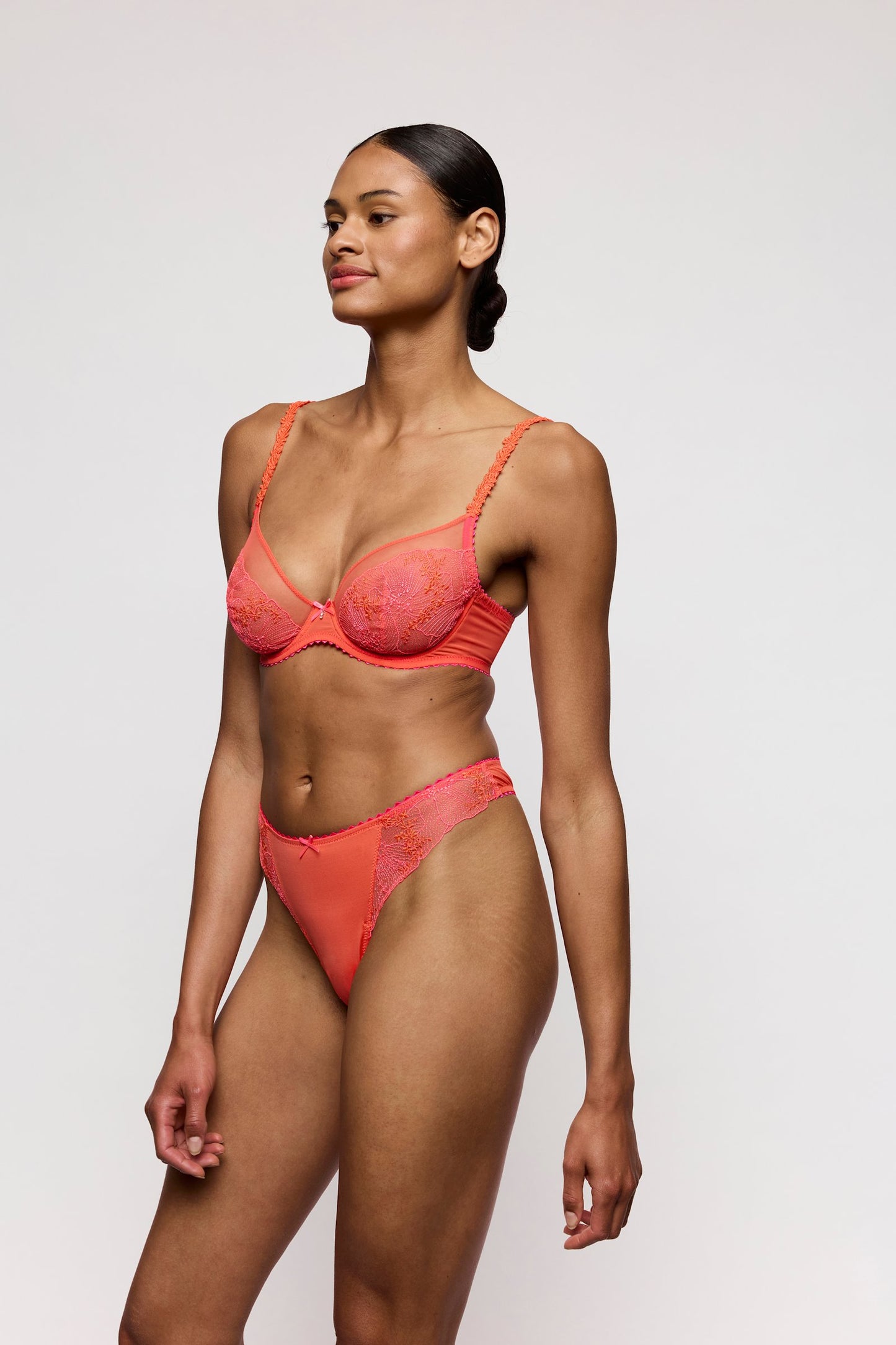 Marie Jo Solene Plunge Bra styled on model in Pamplemousse