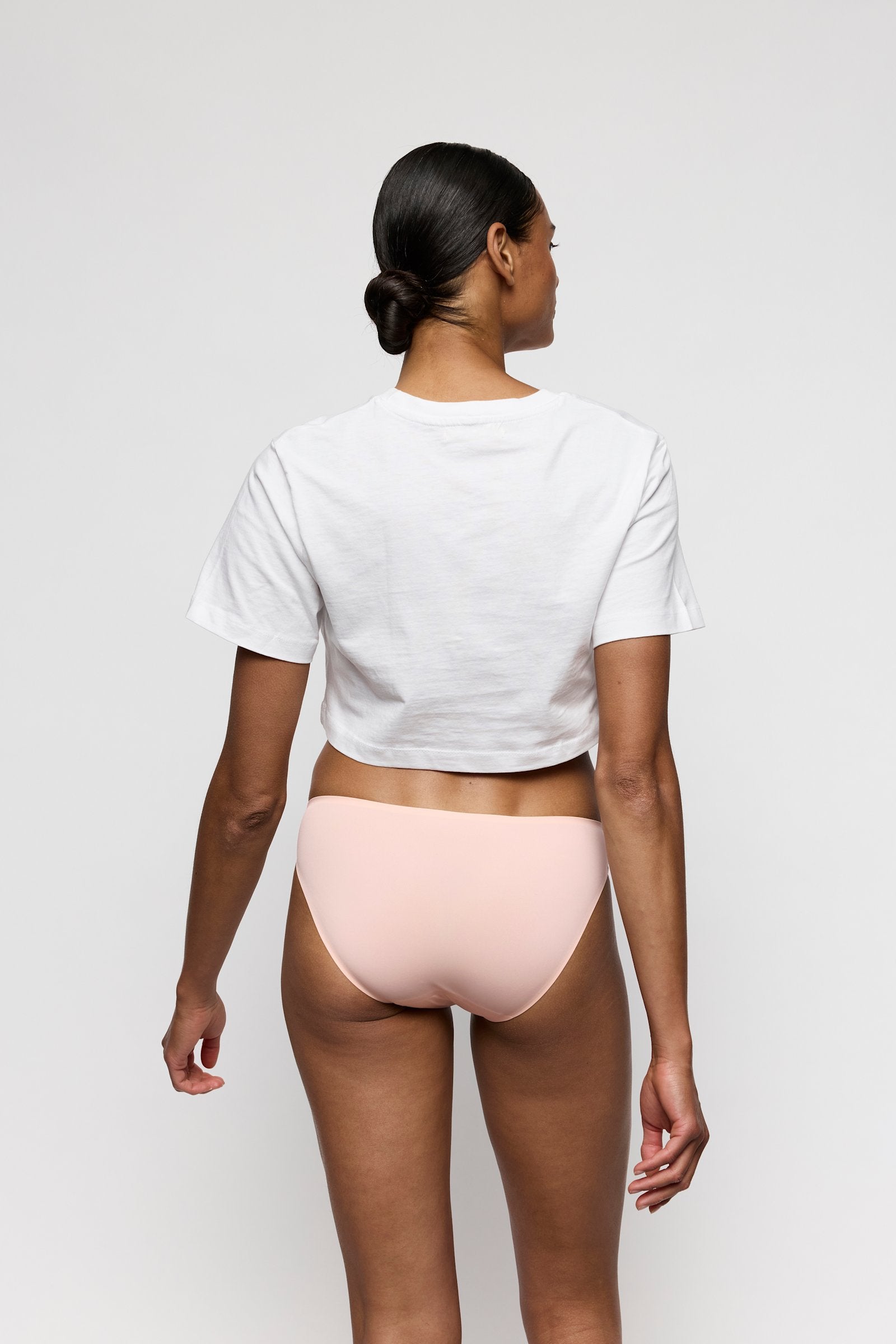 Marie Jo Color Studio Brief styled on model in Glossy Pink