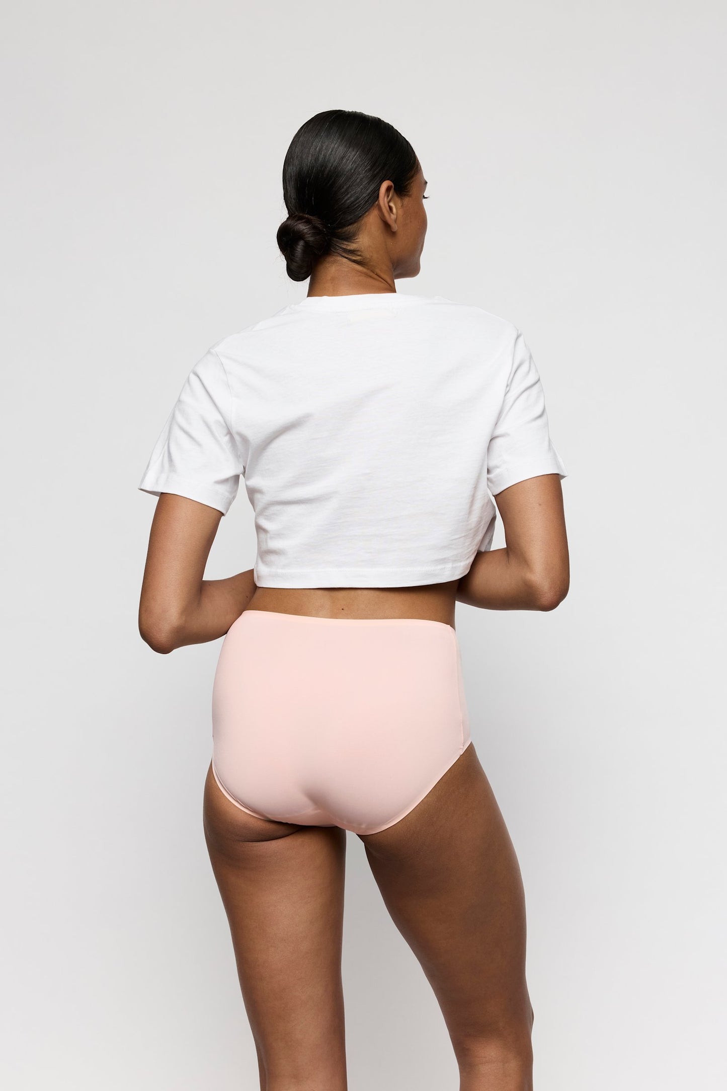 Marie Jo Color Studio Brief styled on model in Glossy Pink