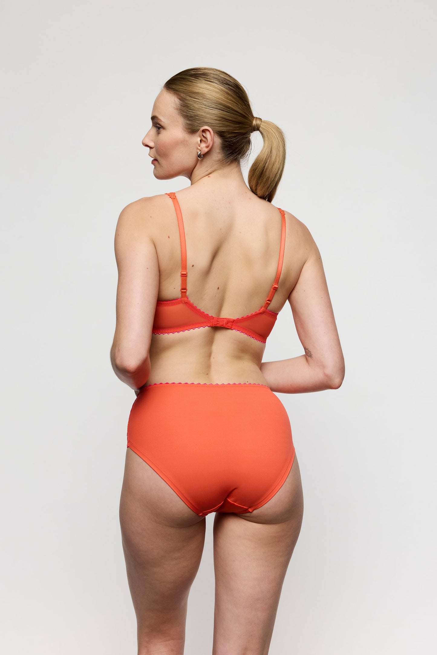 Marie Jo Solene Padded Heartshape Bra styled on model in Pamplemousse