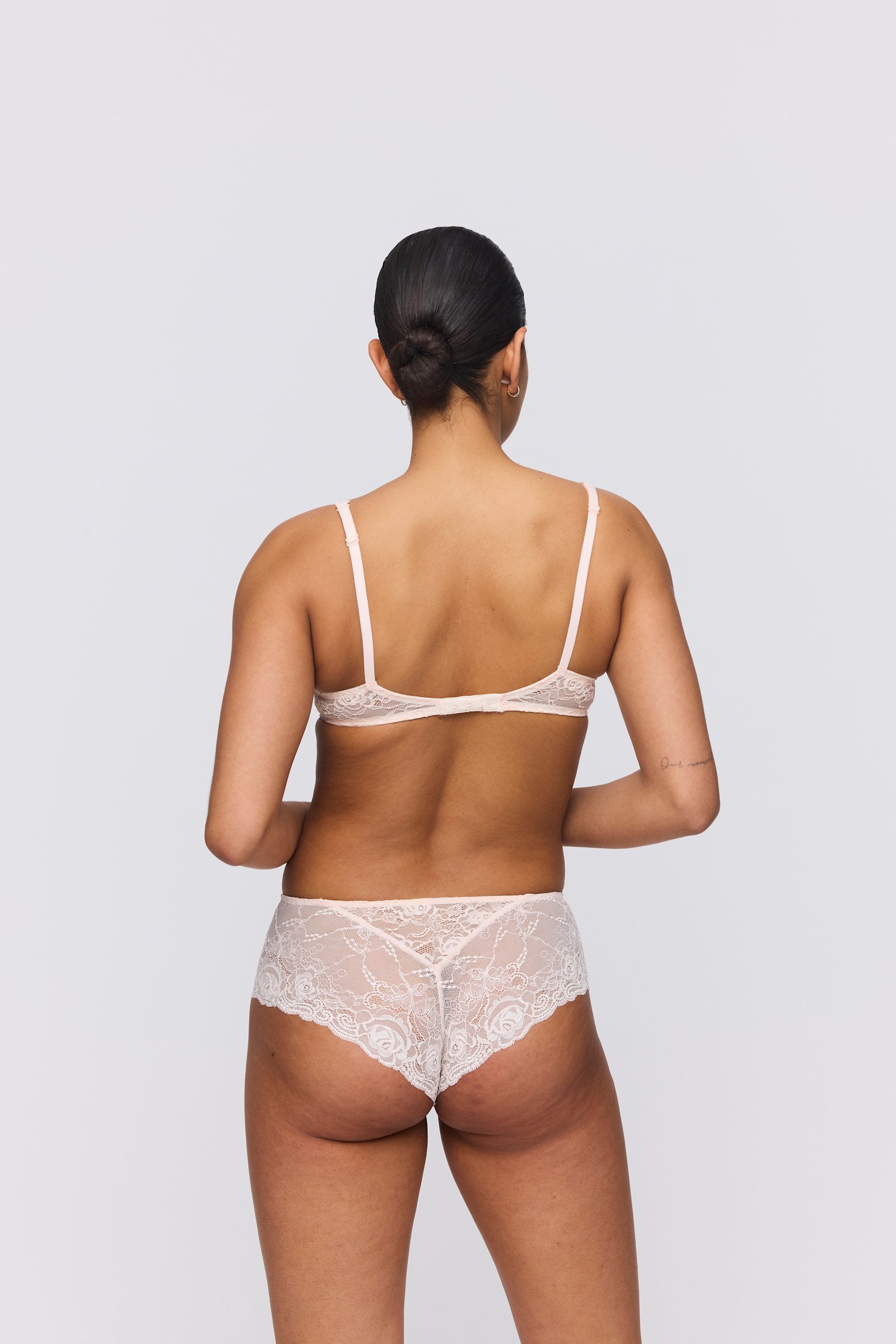Marie Jo Cyrile Padded Plunge Bra styled on model in Crystal Pink