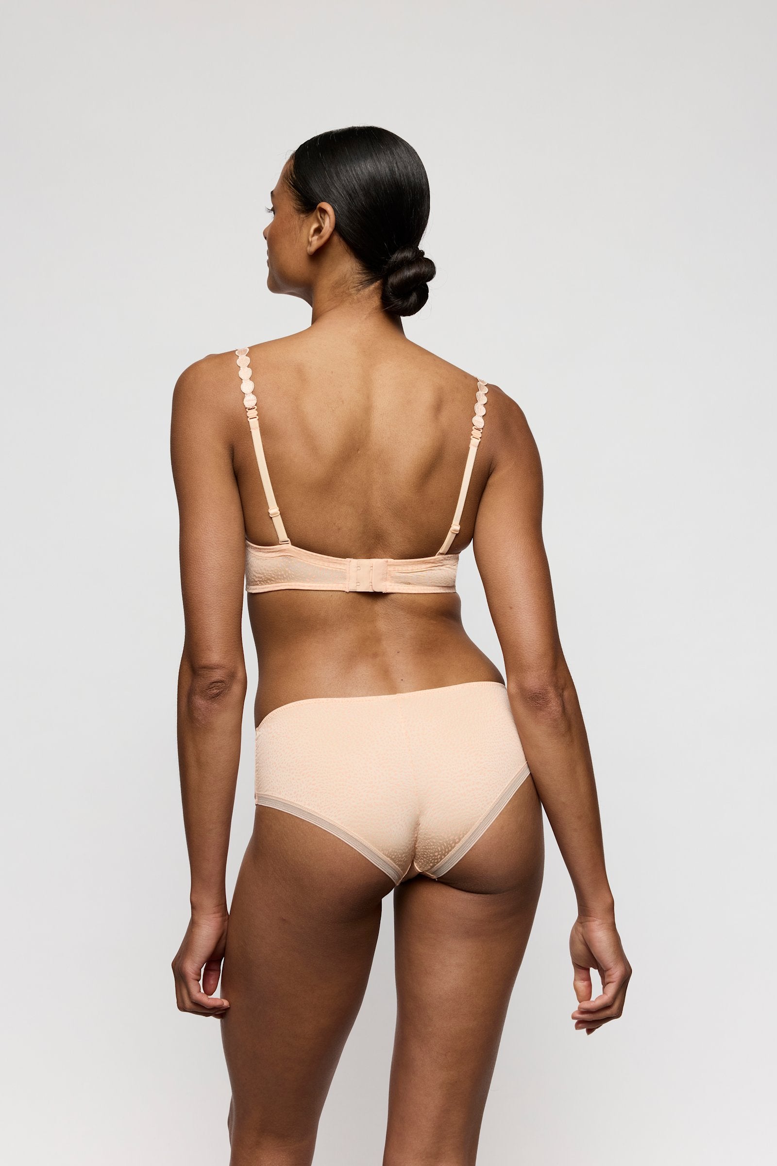 Marie Jo Tom Plunge Bra styled on model in Peach Whisper