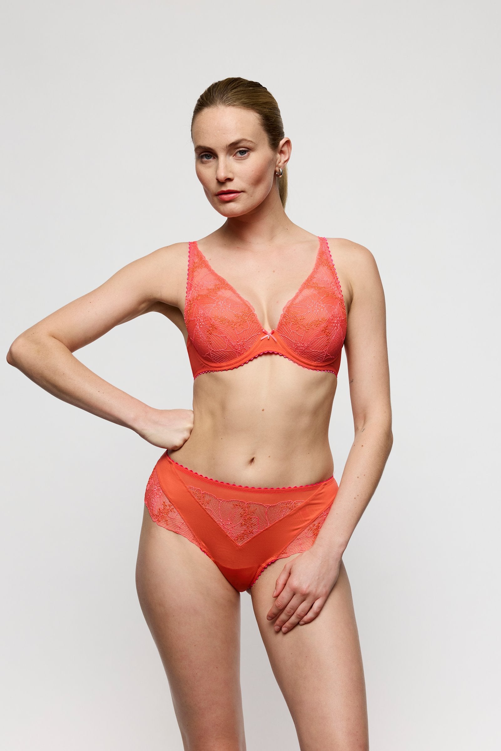 Marie Jo Solene Luxury Thong styled on model in Pamplemousse
