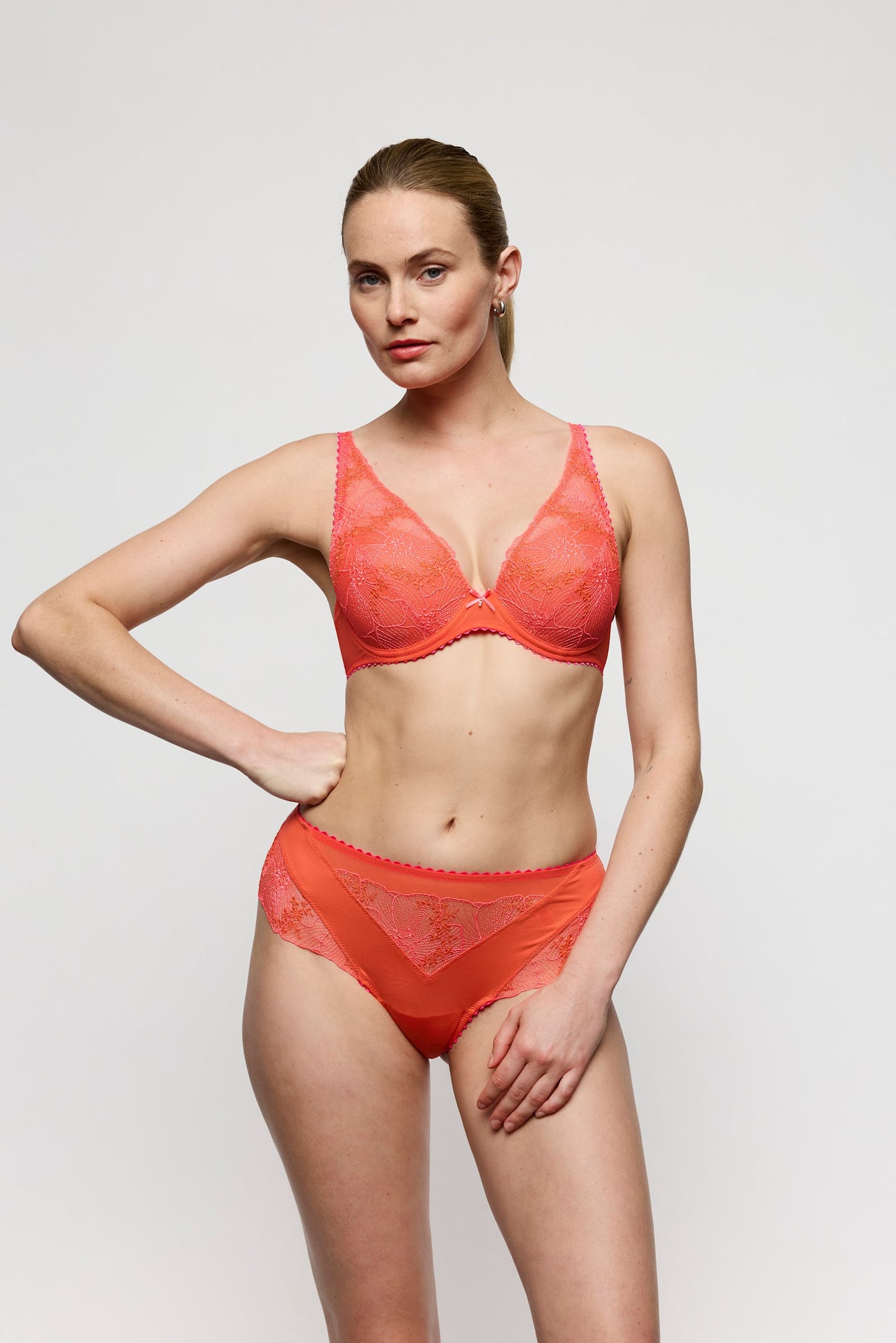 Marie Jo Solene Padded Plunge Bra styled on model in Pamplemousse