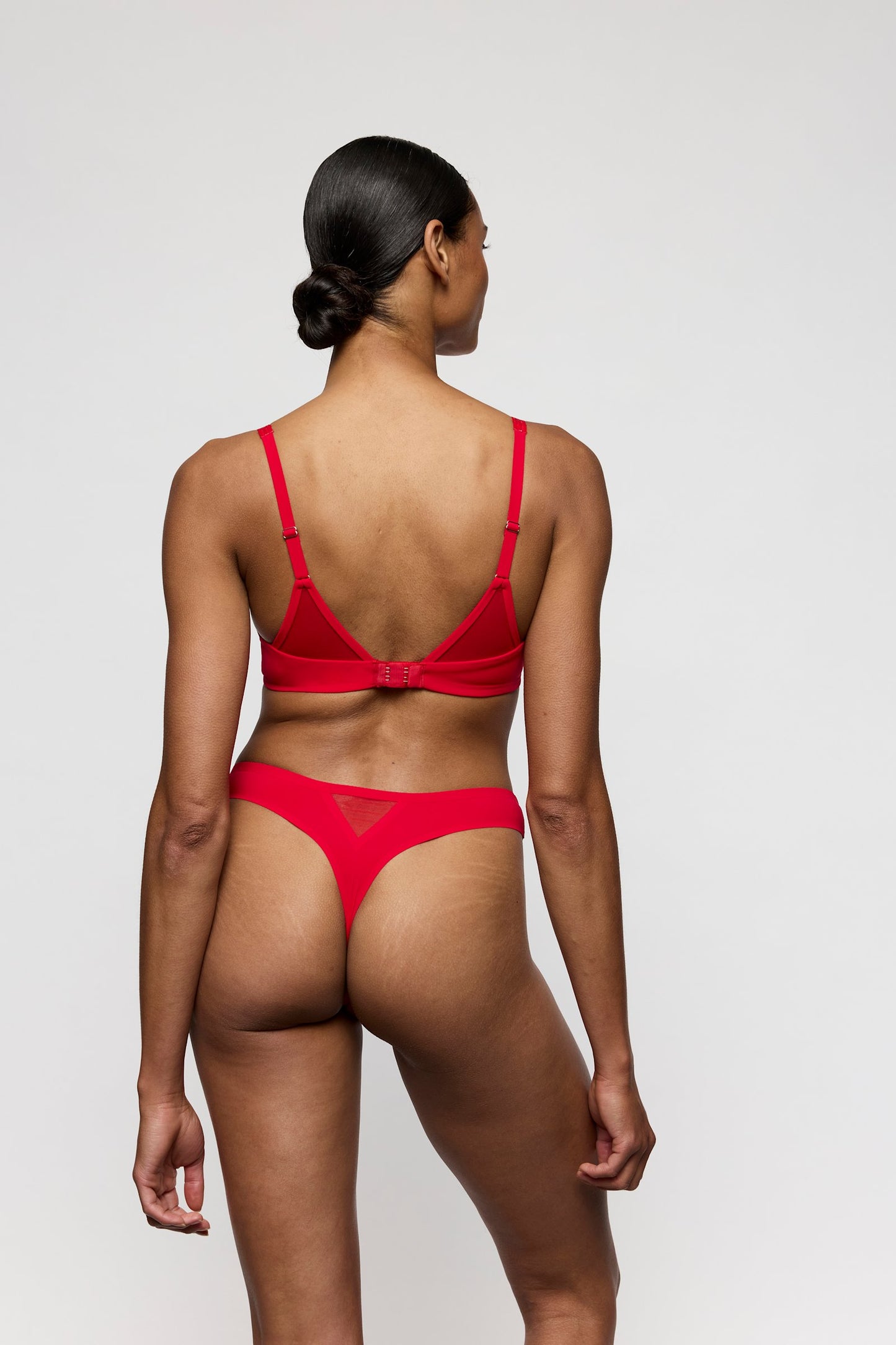 Marie Jo Louie Thong styled on model in True Red