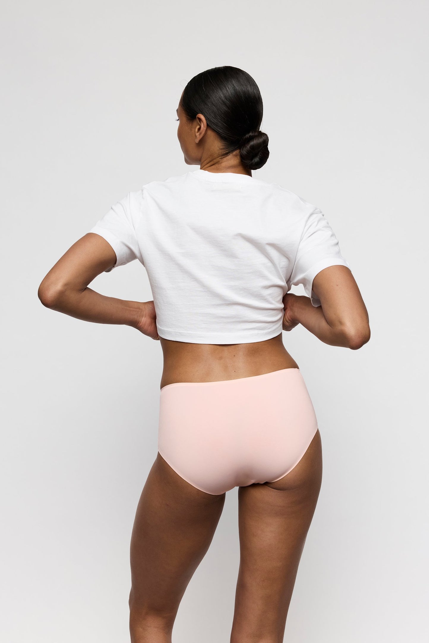Marie Jo Color Studio Brief styled on model in Glossy Pink