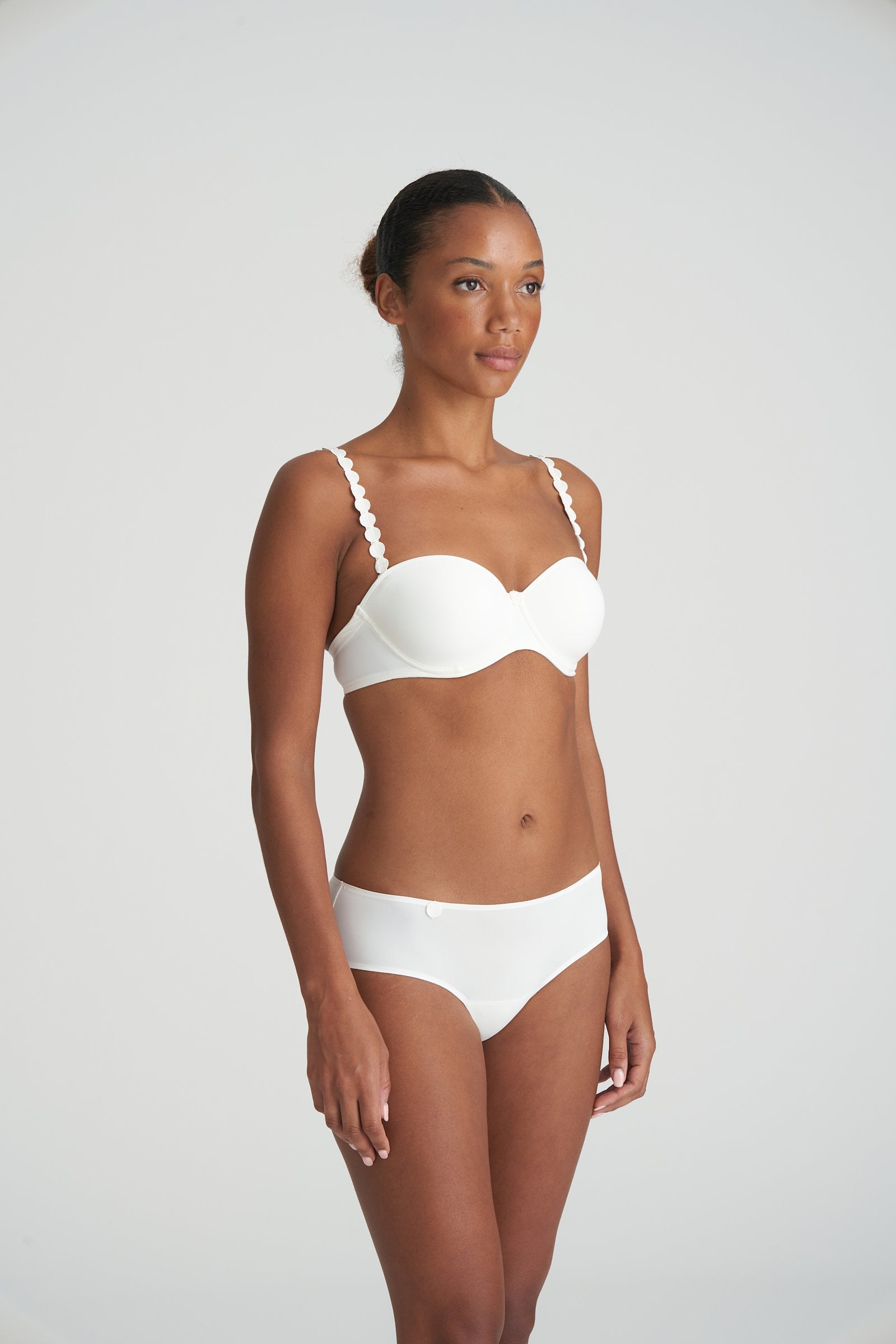 Marie Jo Tom Strapless Bra styled on model in Natural