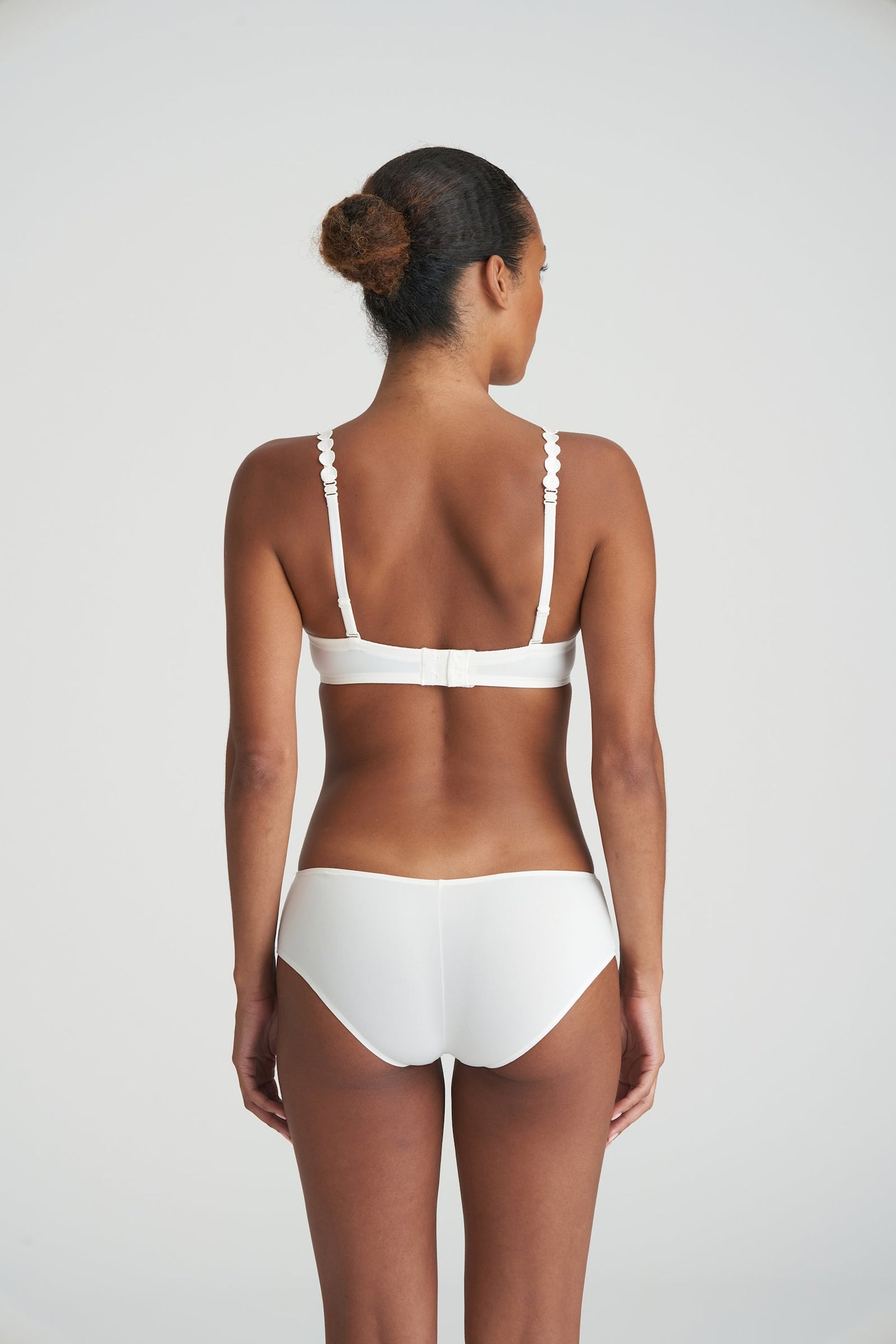 Marie Jo Tom Strapless Bra styled on model in Natural