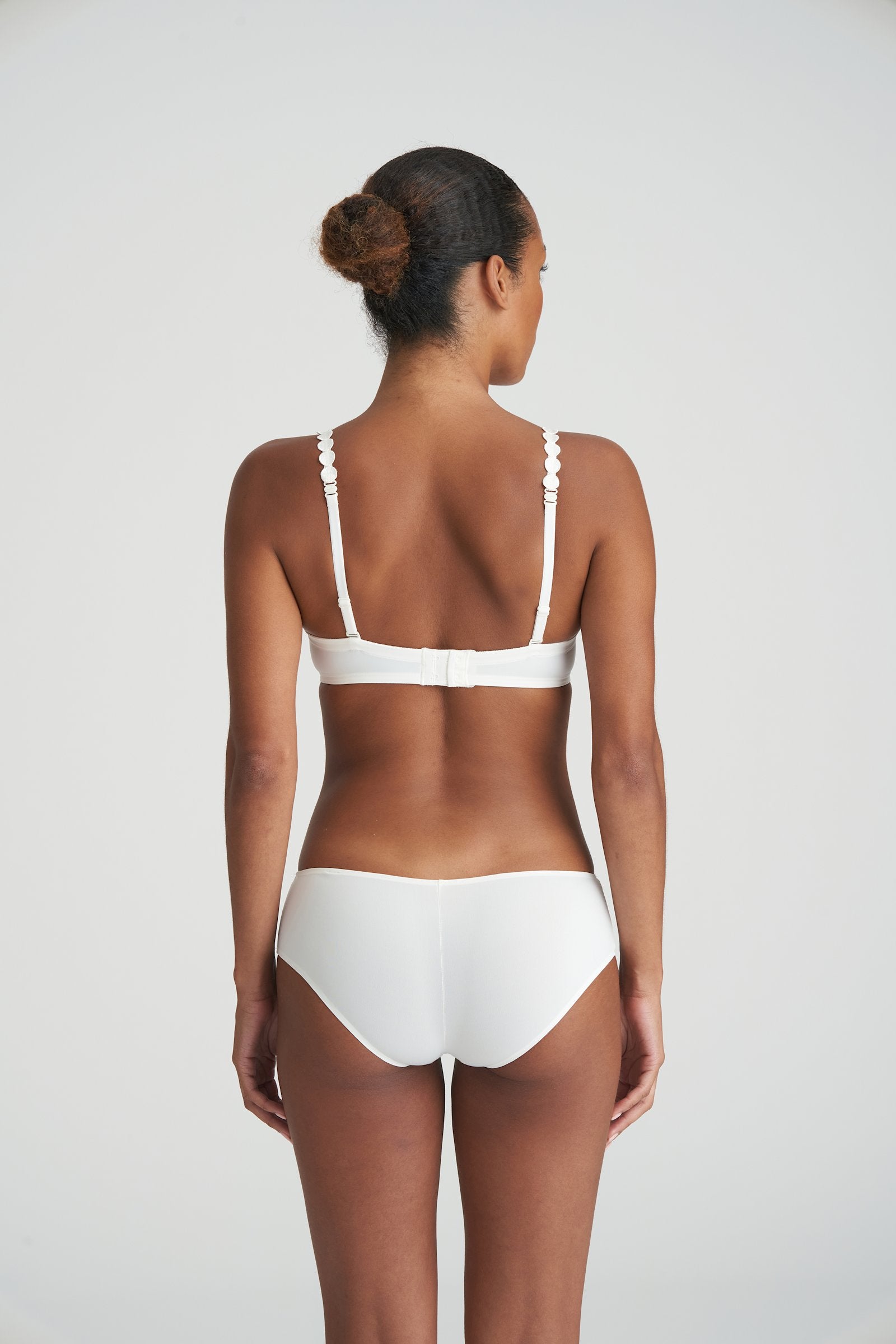 Marie Jo Tom Strapless Bra styled on model in Natural