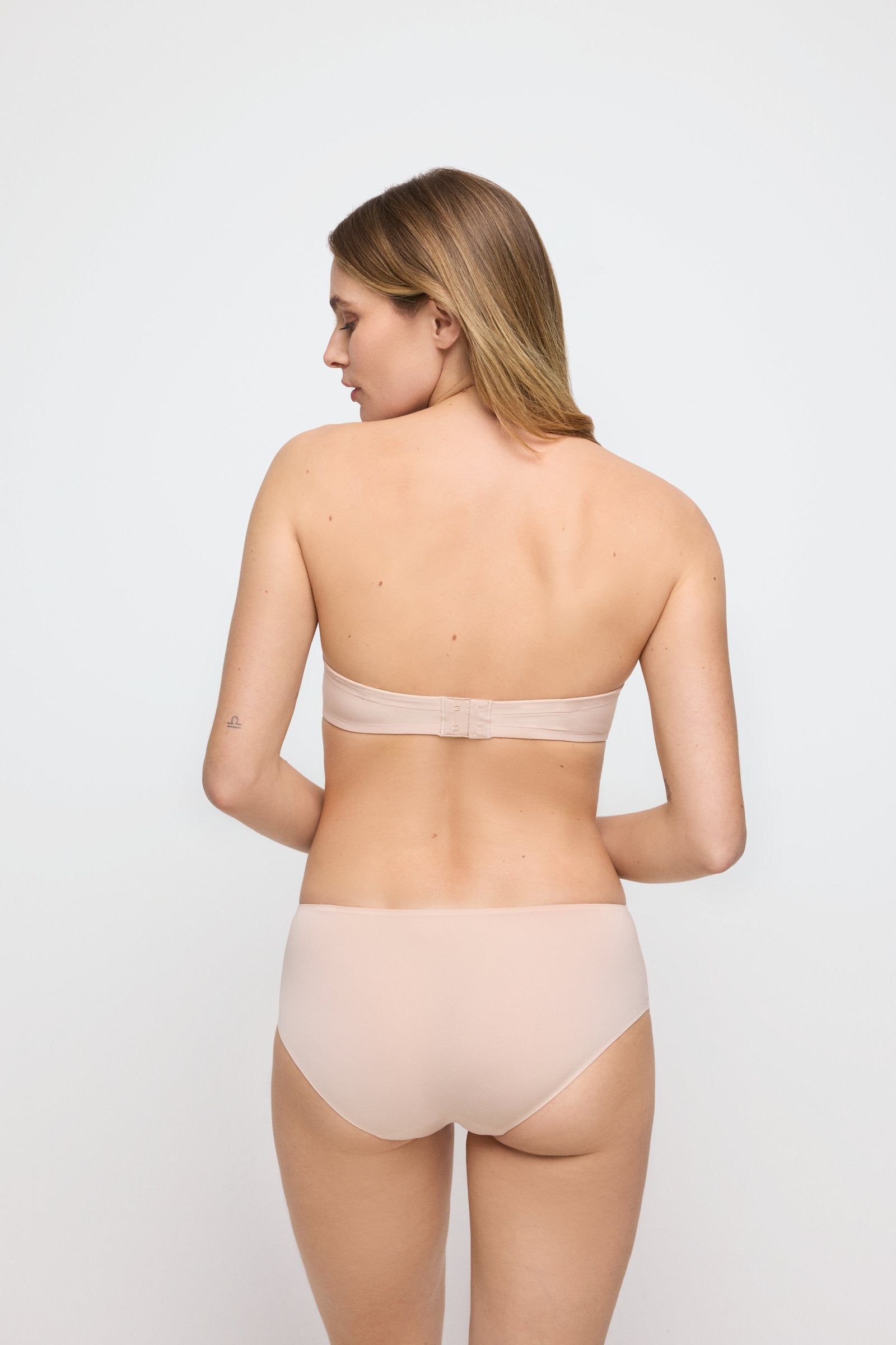 Marie Jo Tom Strapless Bra styled on model in Caffé Latte