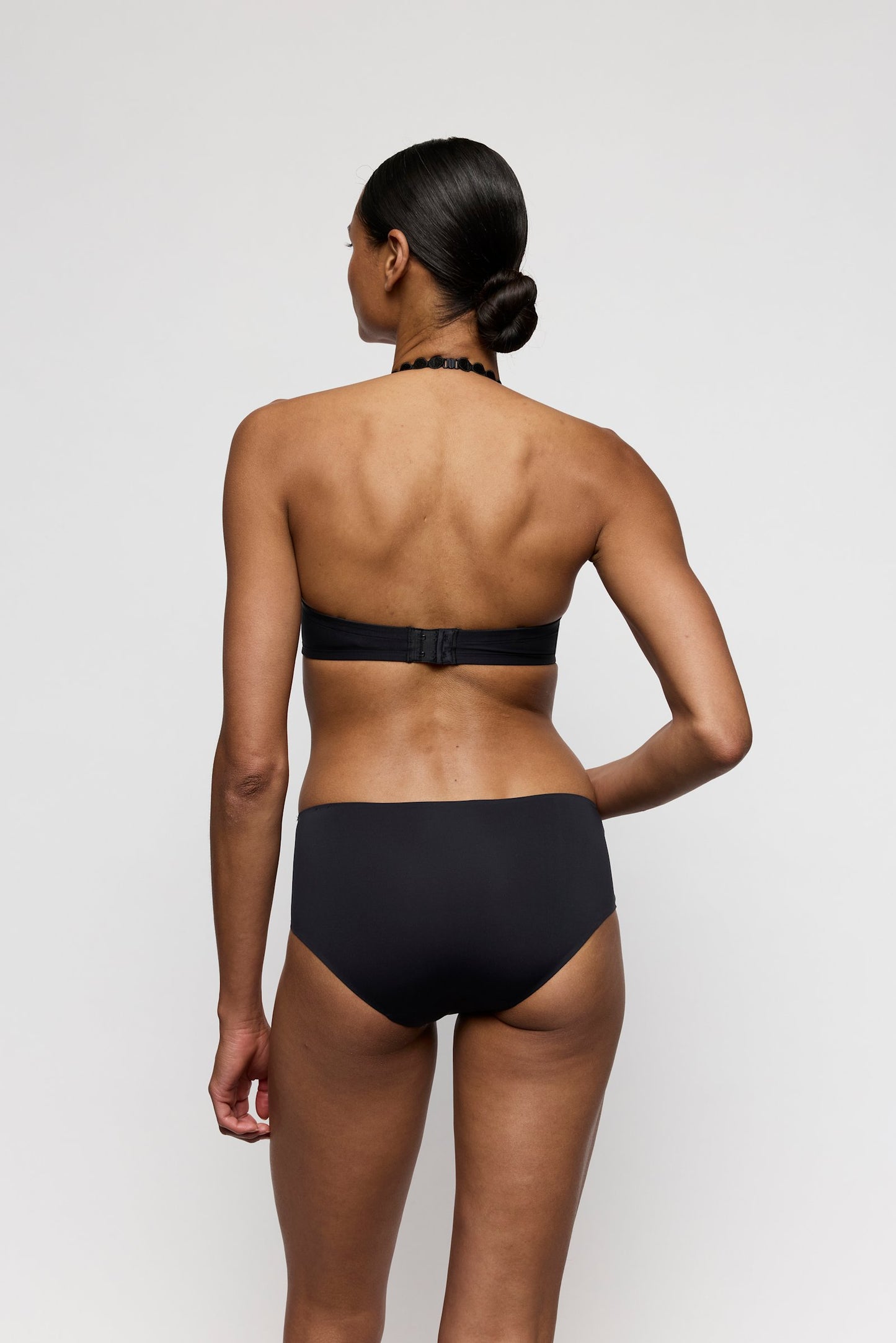 Marie Jo Tom Strapless Bra styled on model in Charcoal
