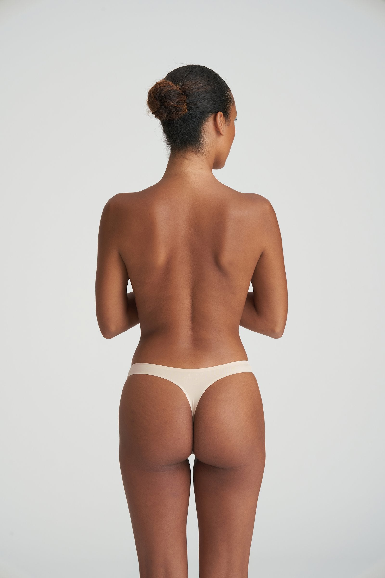 Marie Jo Color Studio Thong styled on model in Caffé Latte