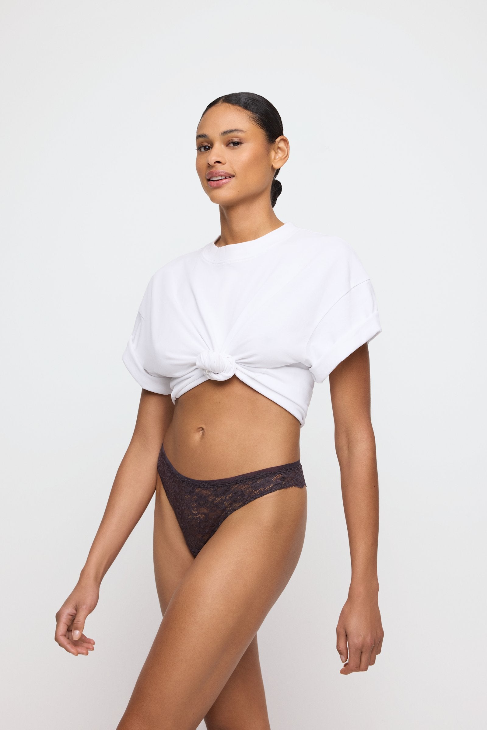 Marie Jo Color Studio Thong styled on model in Sweet Chocolate