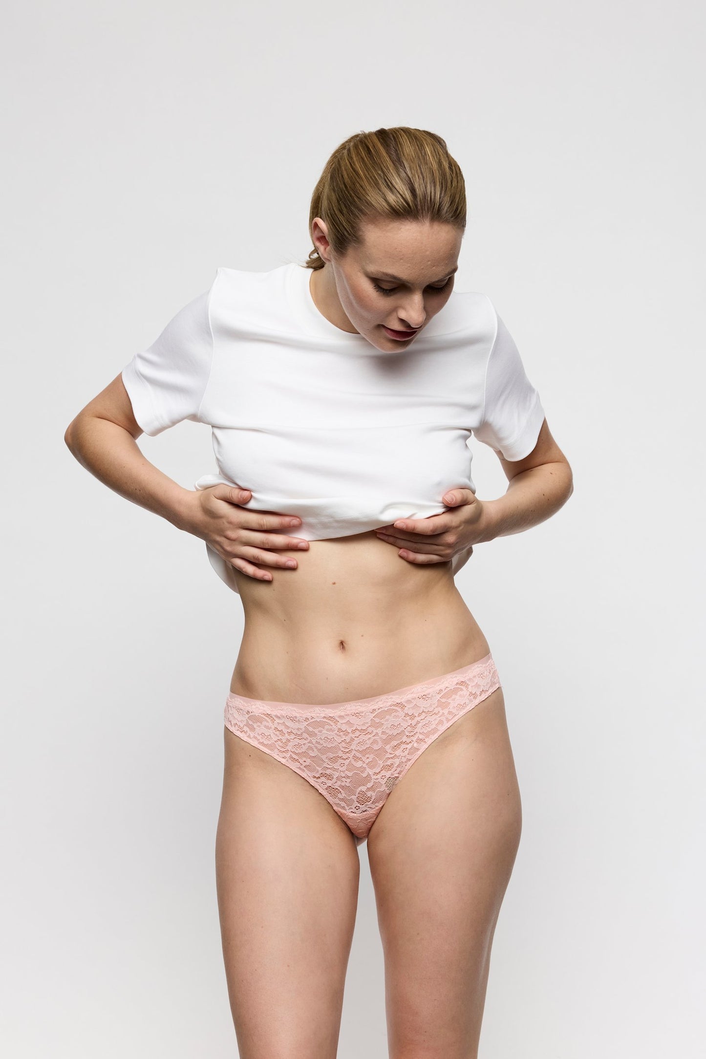 Marie Jo Color Studio Thong styled on model in Glossy Pink