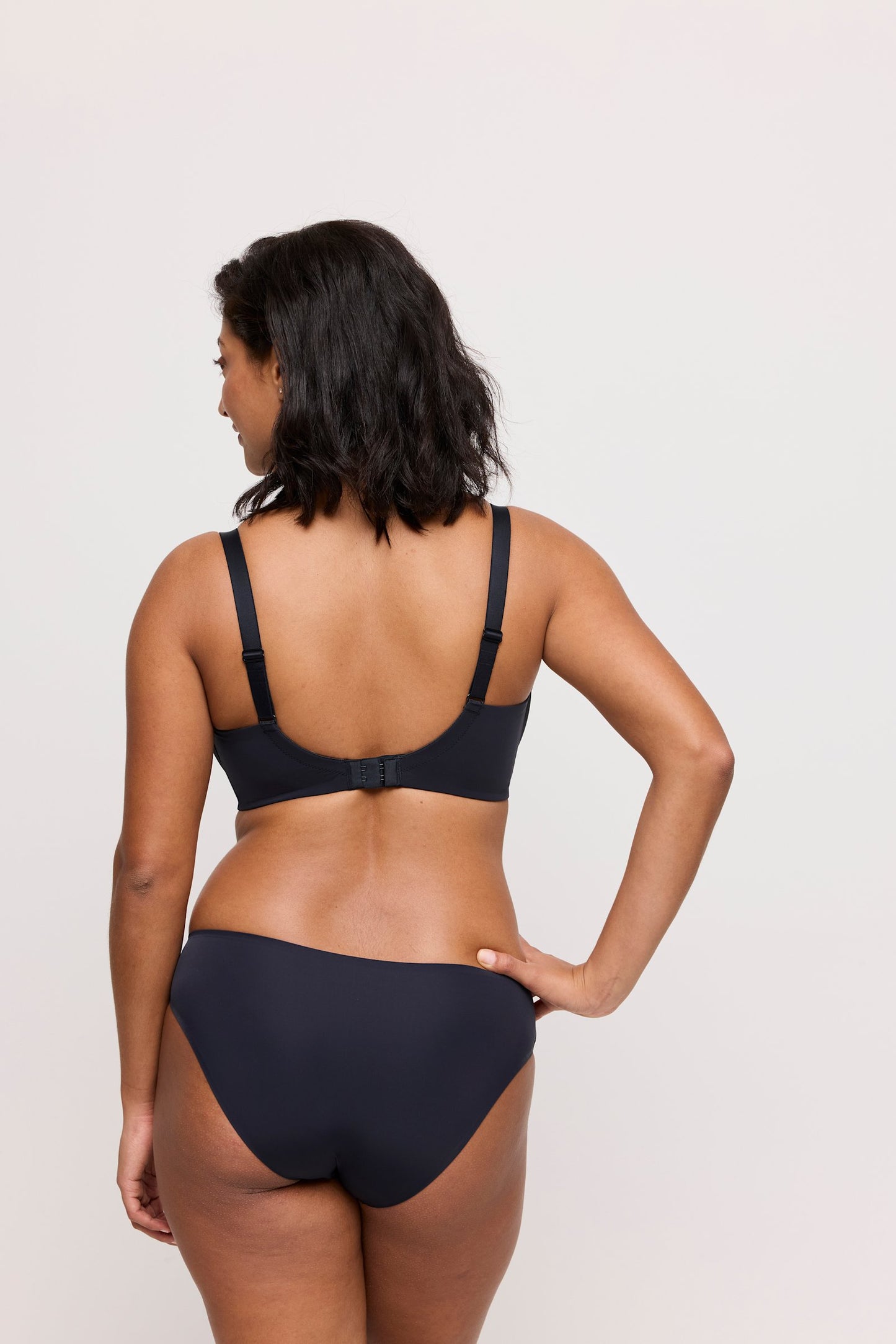 PrimaDonna Figuras Padded Balcony Bra on model in Charcoal