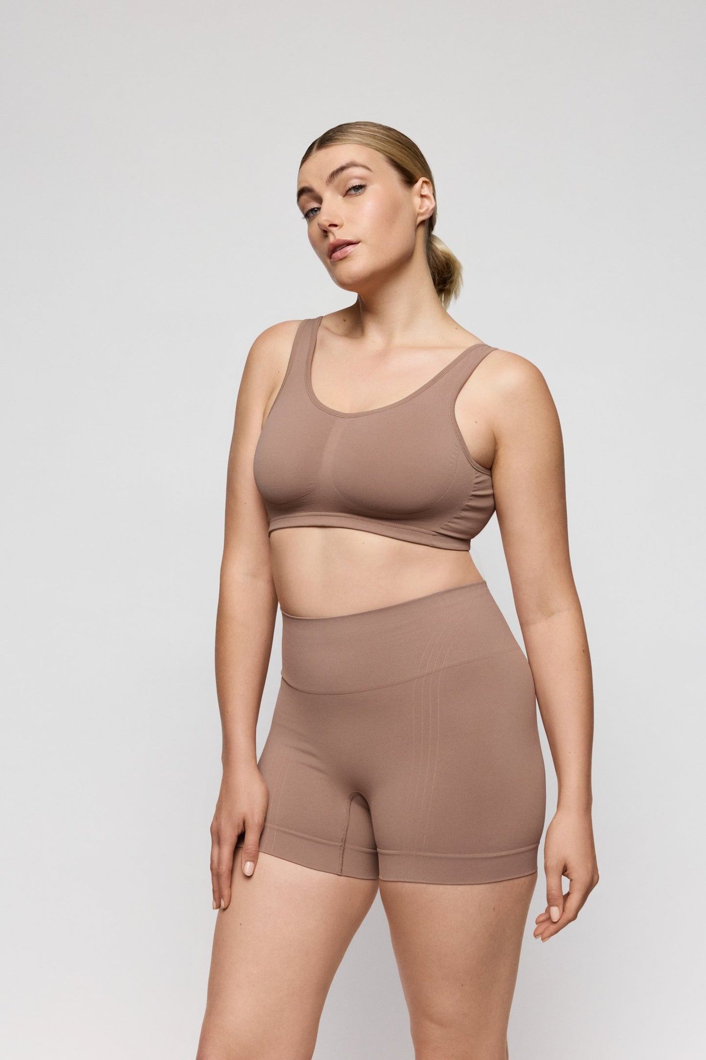 PrimaDonna Nudda Shapewear Long-Leg Shaper on model in Ginger