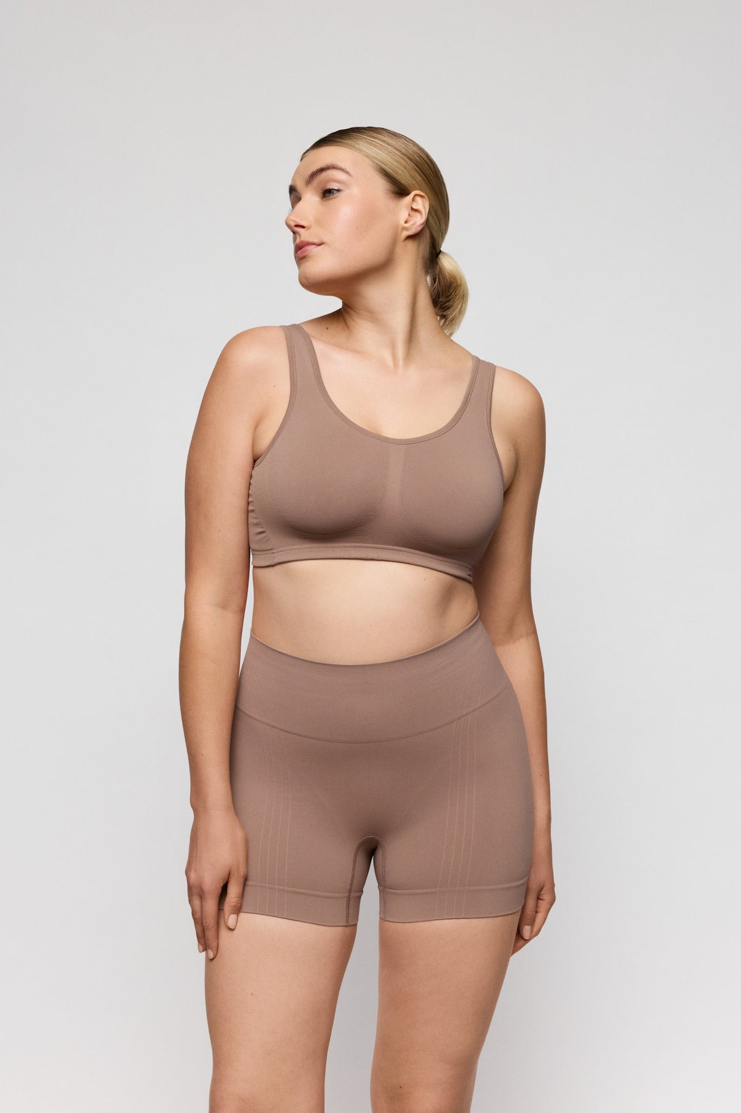 PrimaDonna Nudda Shapewear Long-Leg Shaper on model in Ginger