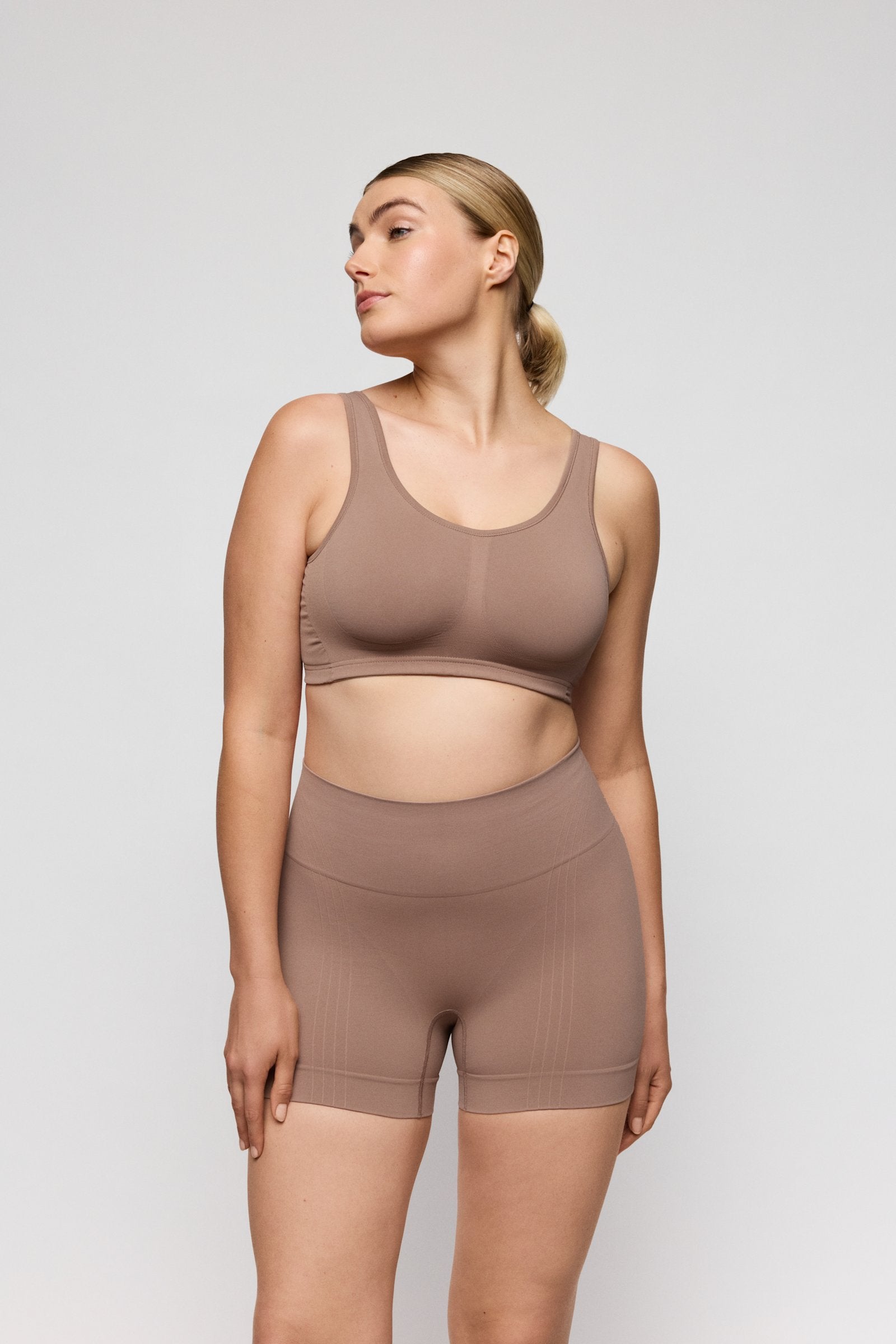 PrimaDonna Nudda Shapewear Long-Leg Shaper on model in Ginger