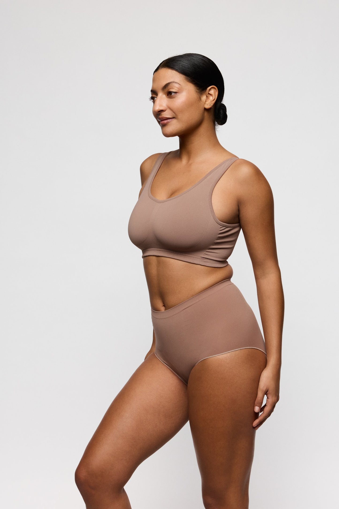 PrimaDonna Nudda Shapewear High Brief on model in Ginger
