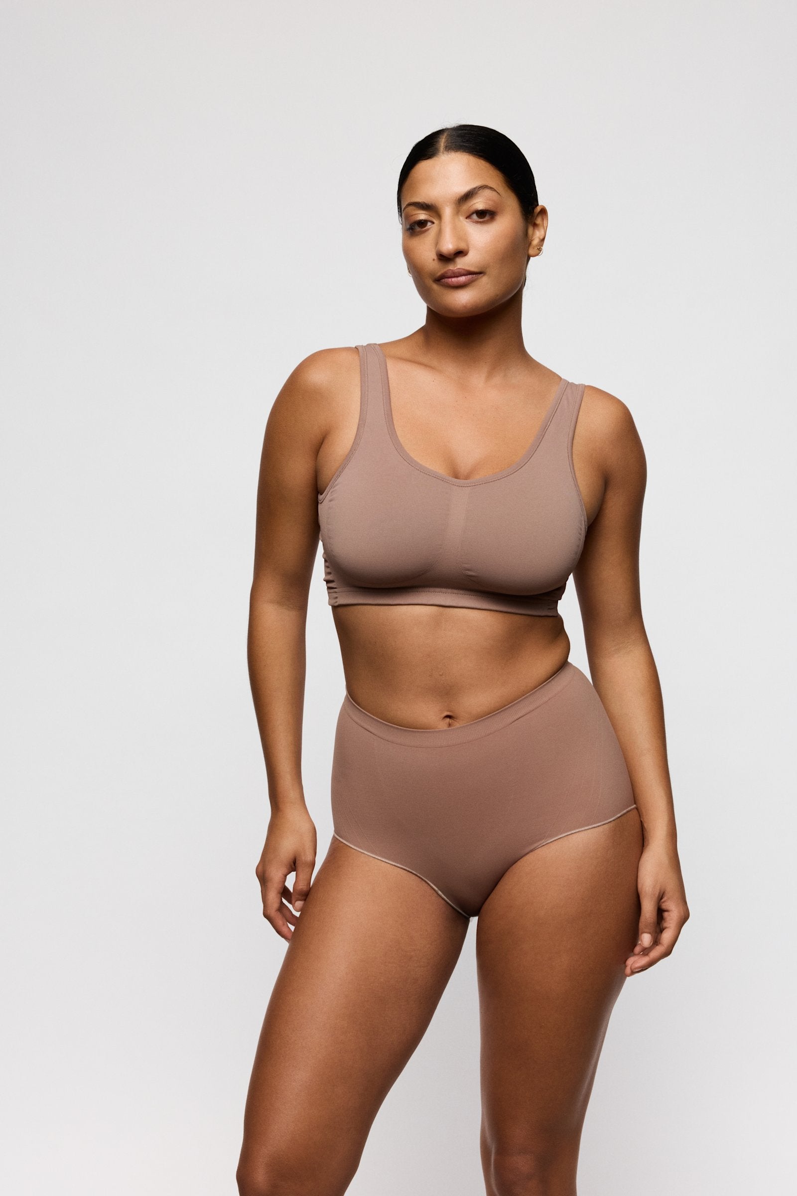 PrimaDonna Nudda Shapewear High Brief on model in Ginger
