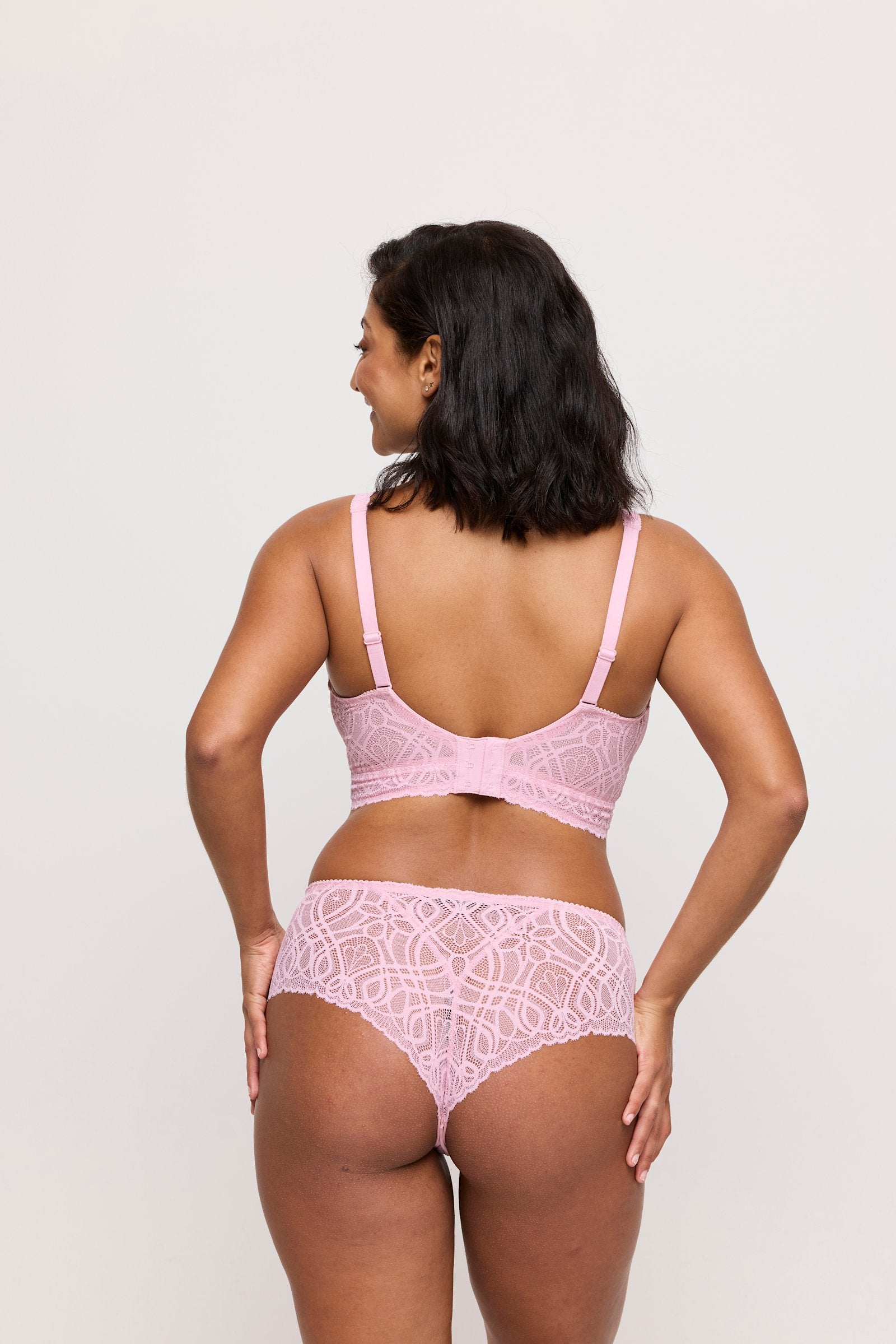 PrimaDonna Salerno Luxury Thong on model in Spring Rose
