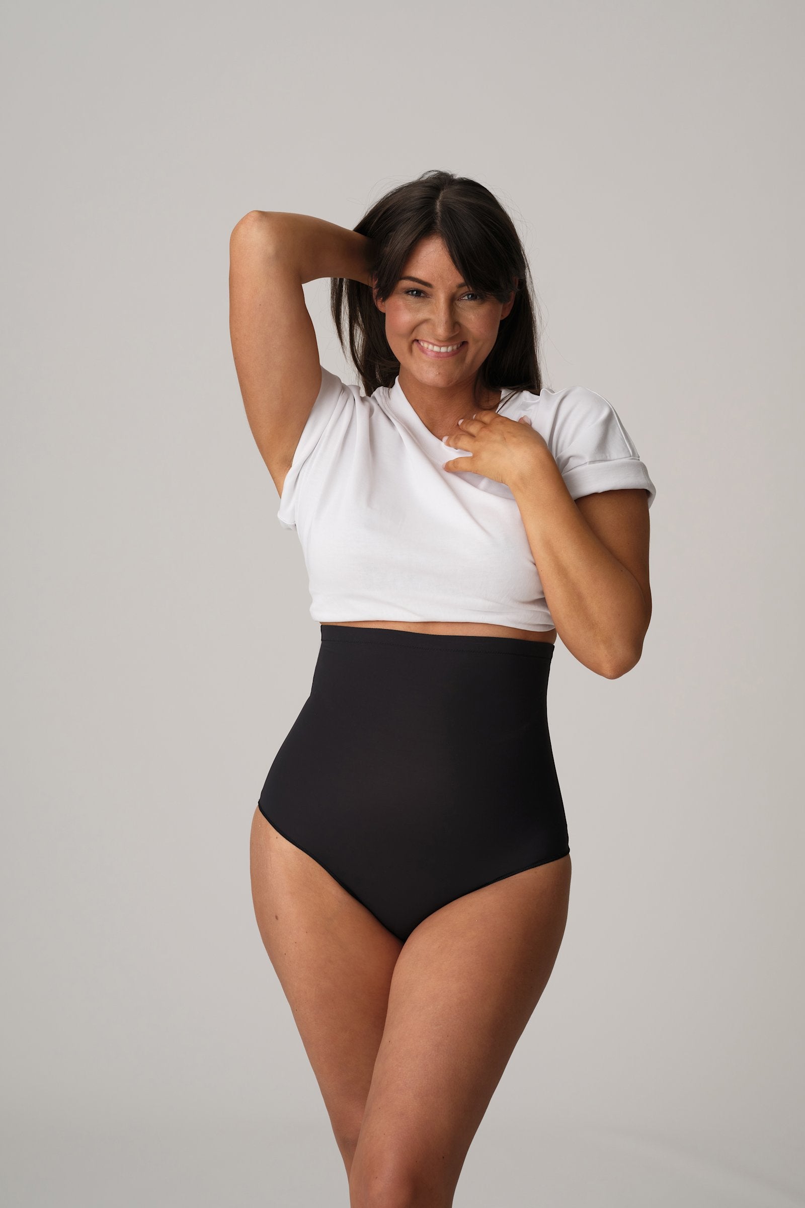 PrimaDonna Perle Shapewear High Brief on model in Charcoal
