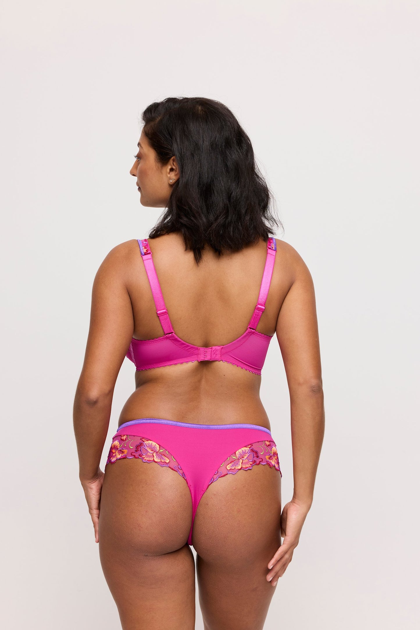 PrimaDonna Devdaha Luxury Thong on model in Very Berry