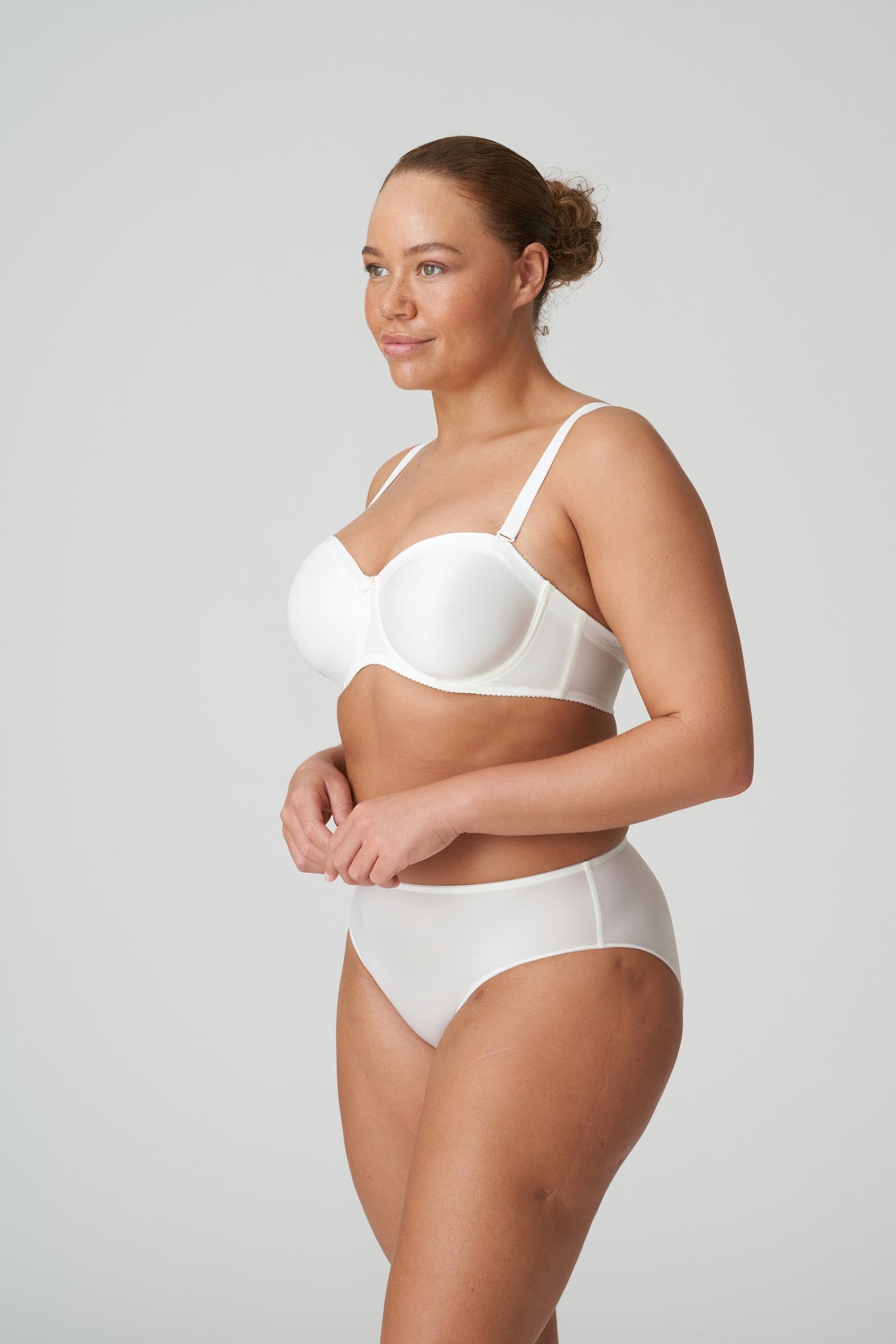 PrimaDonna Satin Strapless Bra on model in Natural