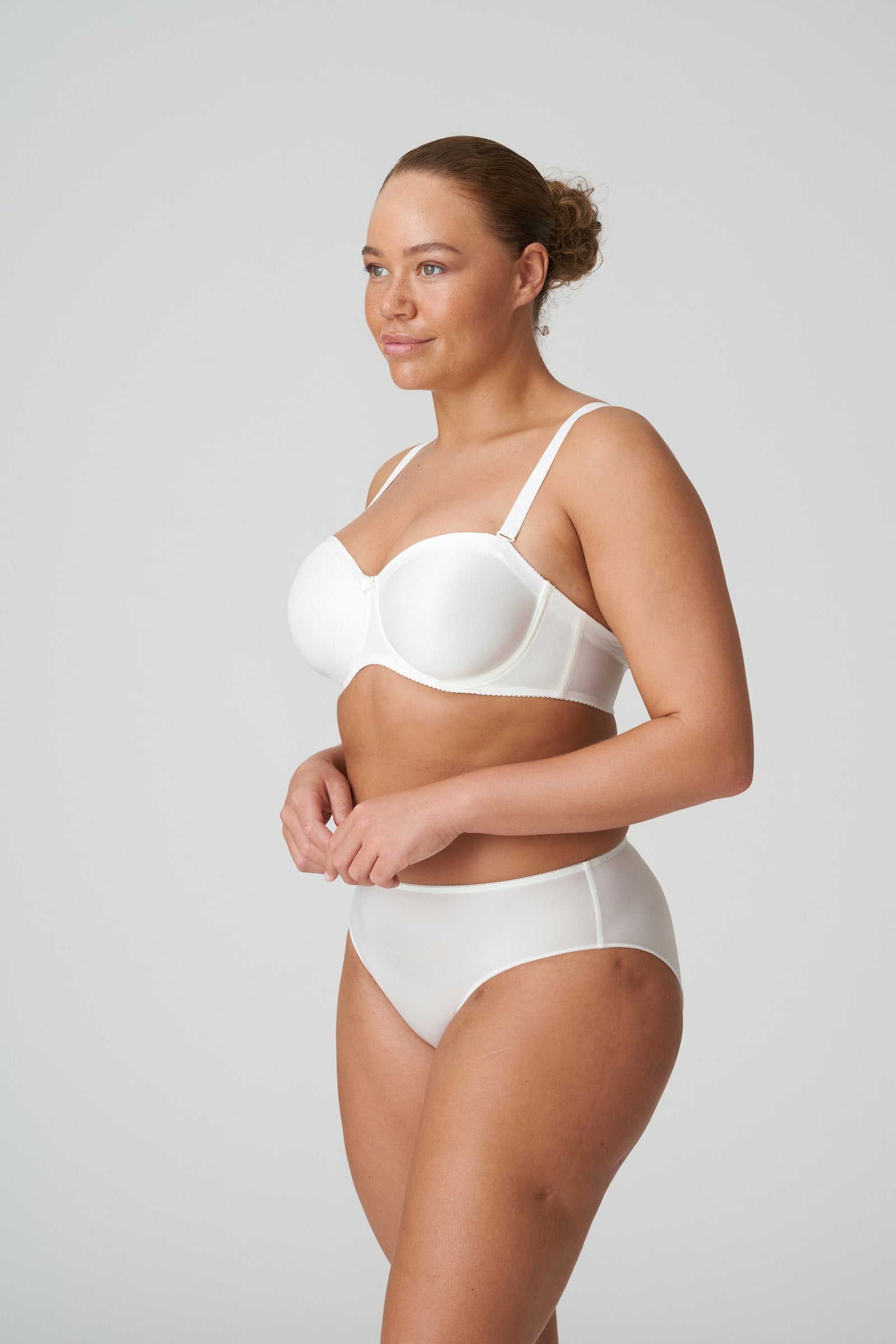 PrimaDonna Satin Strapless Bra on model in Natural