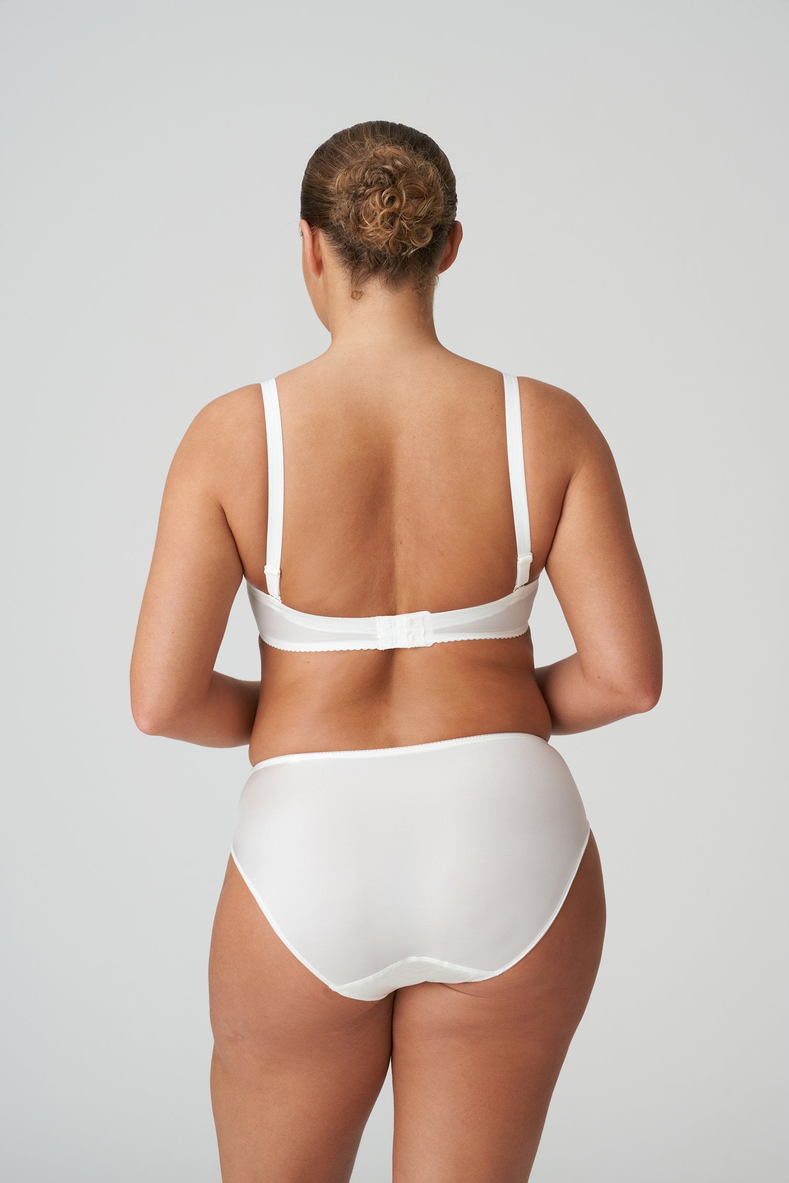 PrimaDonna Satin Strapless Bra on model in Natural