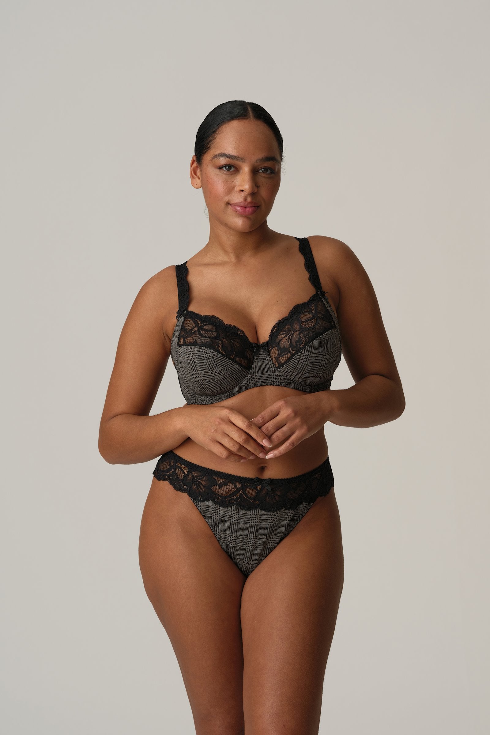 PrimaDonna Madison Thong on model in Black Tailor