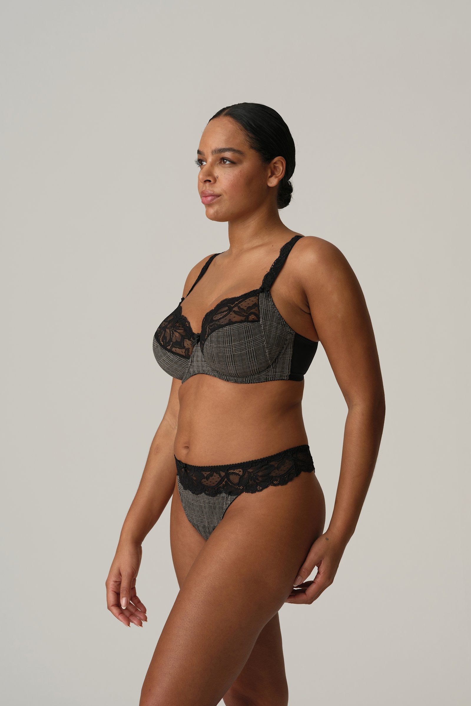 PrimaDonna Madison Thong on model in Black Tailor