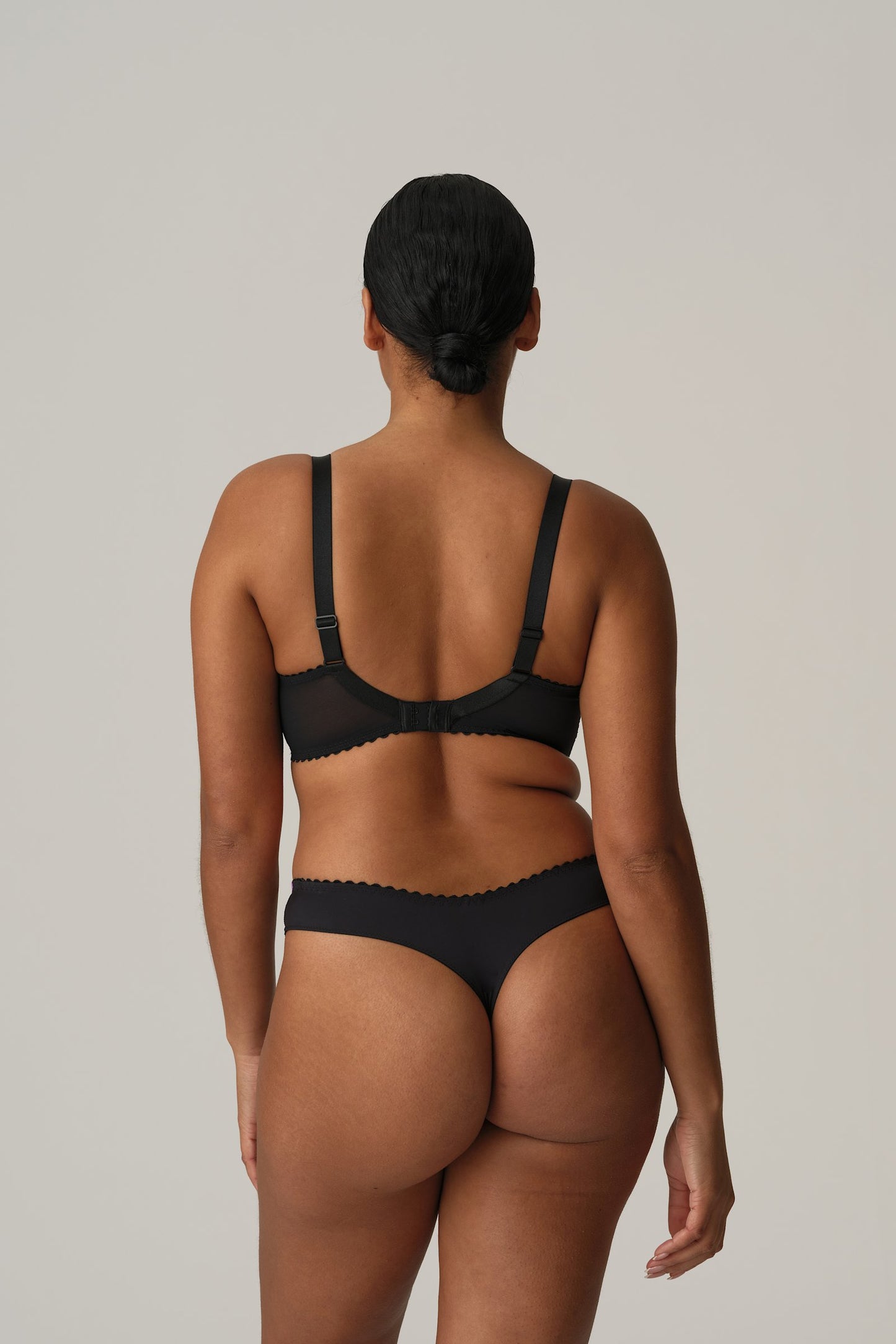 PrimaDonna San Angel Thong on model in Peacock Feather