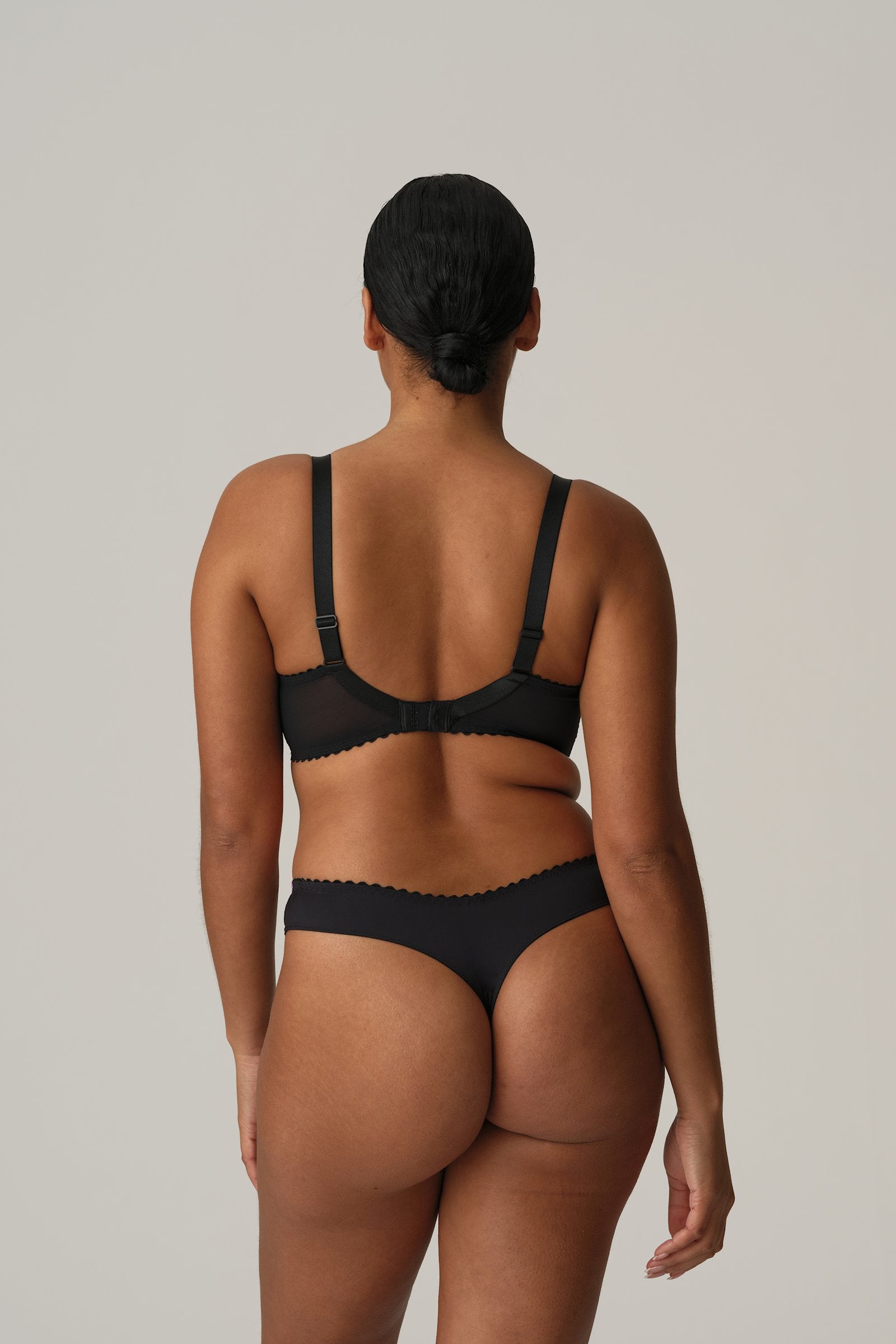 PrimaDonna San Angel Thong on model in Peacock Feather