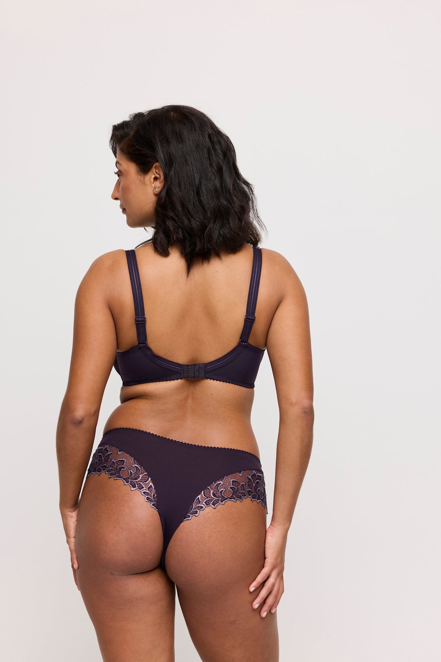 PrimaDonna Deauville Luxury Thong on model in Amethyst Gem